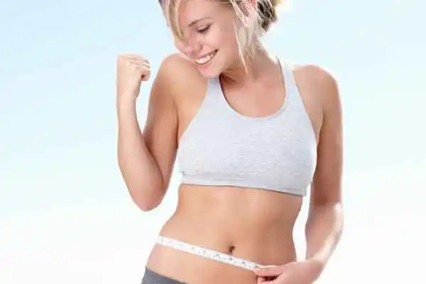 woman happy after fat reduction treatment Greater London (Lewisham)