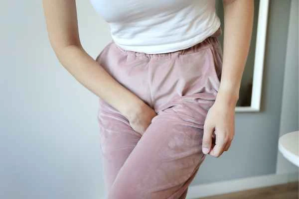 older woman running to the toilet because of urinary incontinence Greater London (Lewisham)